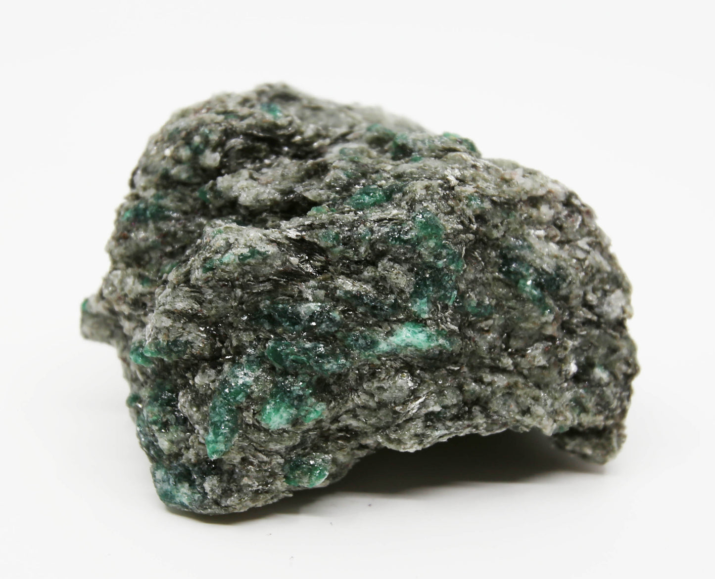 Natural emerald in a matrix of quartz and mica.