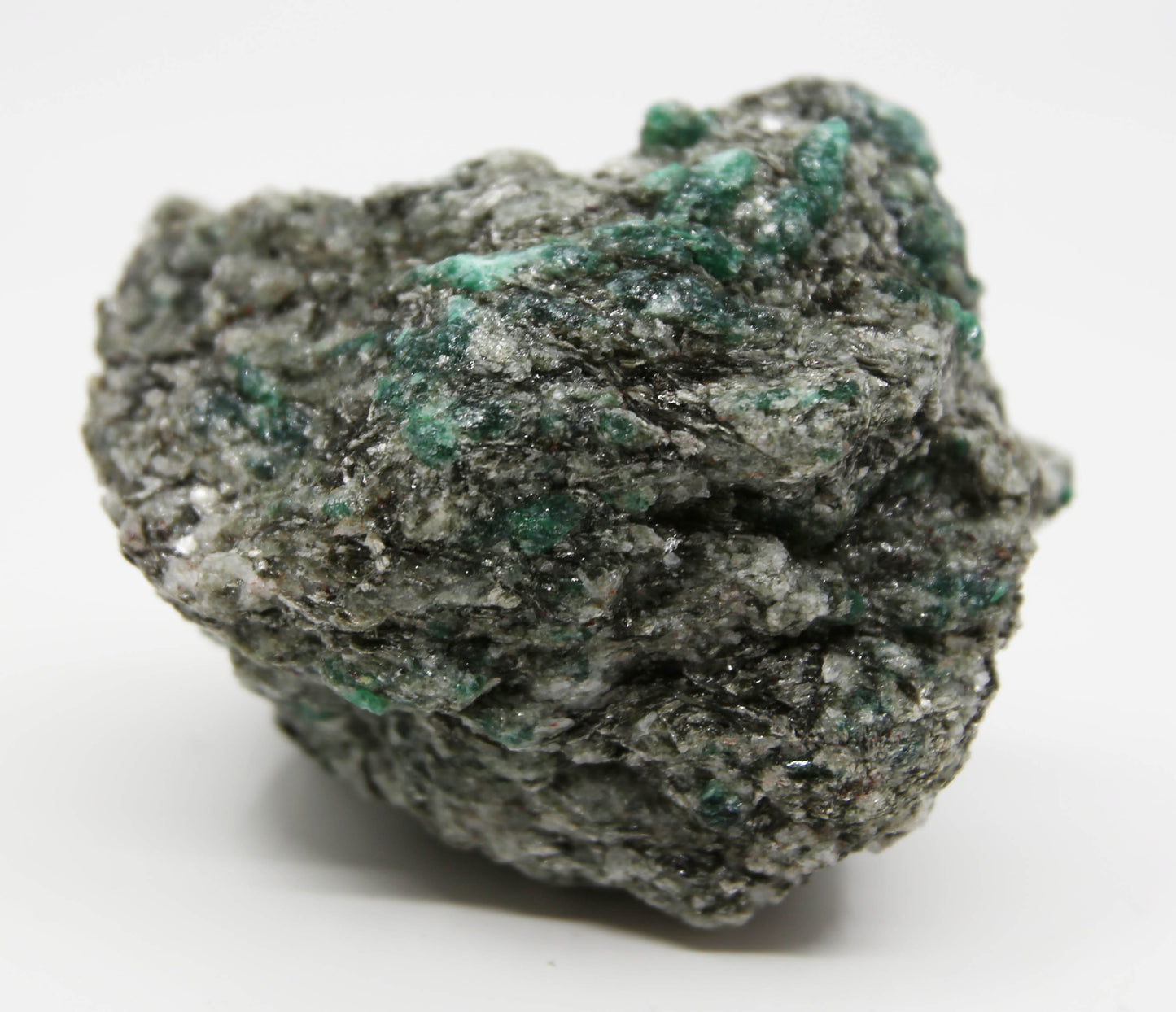 Natural emerald in a matrix of quartz and mica.